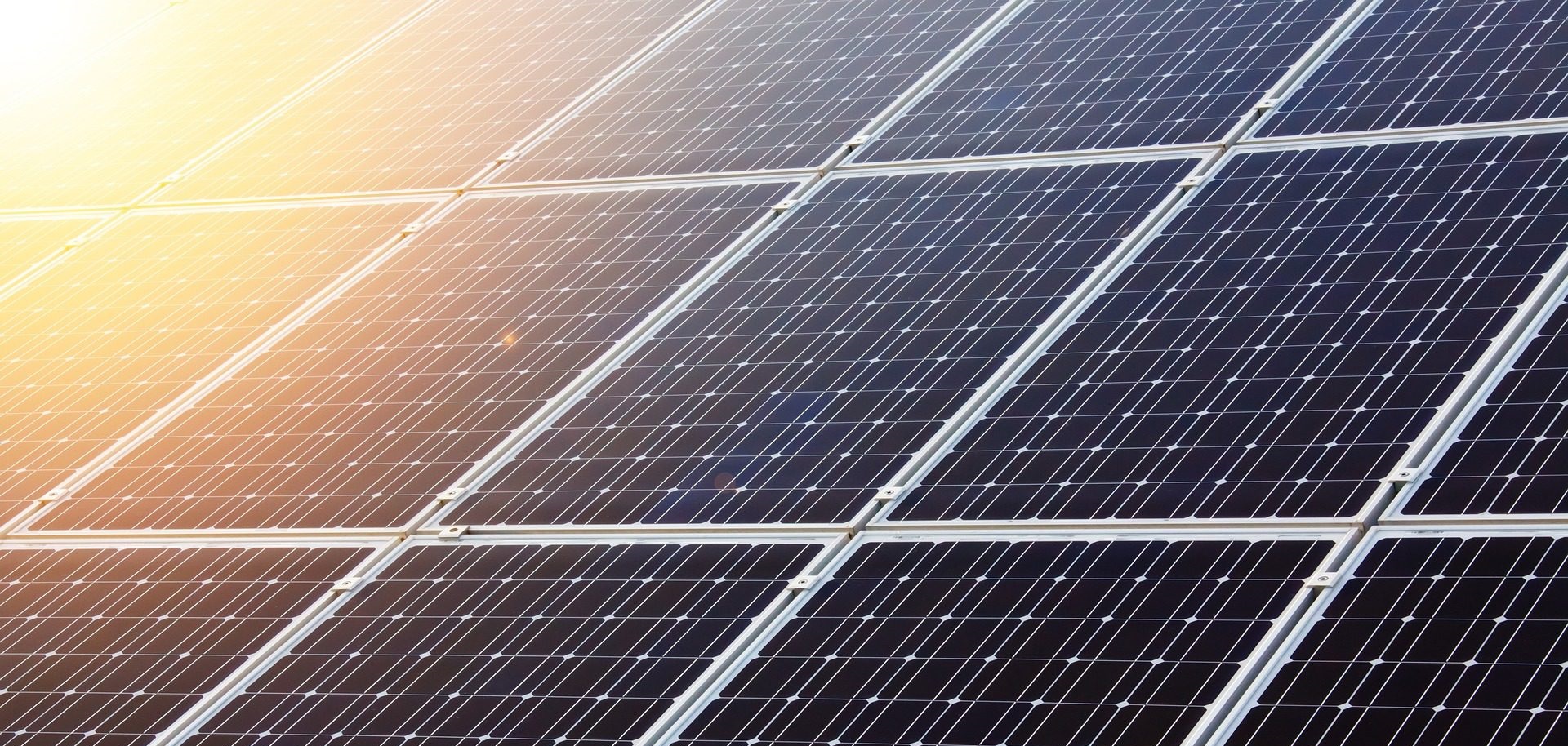 Solar panels with sun on left